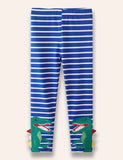 Leggings con apliques de dinosaurio